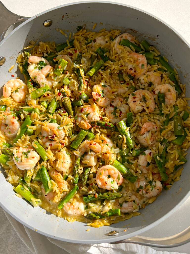 Creamy Shrimp Scampi with Orzo and Asparagus in a large pan