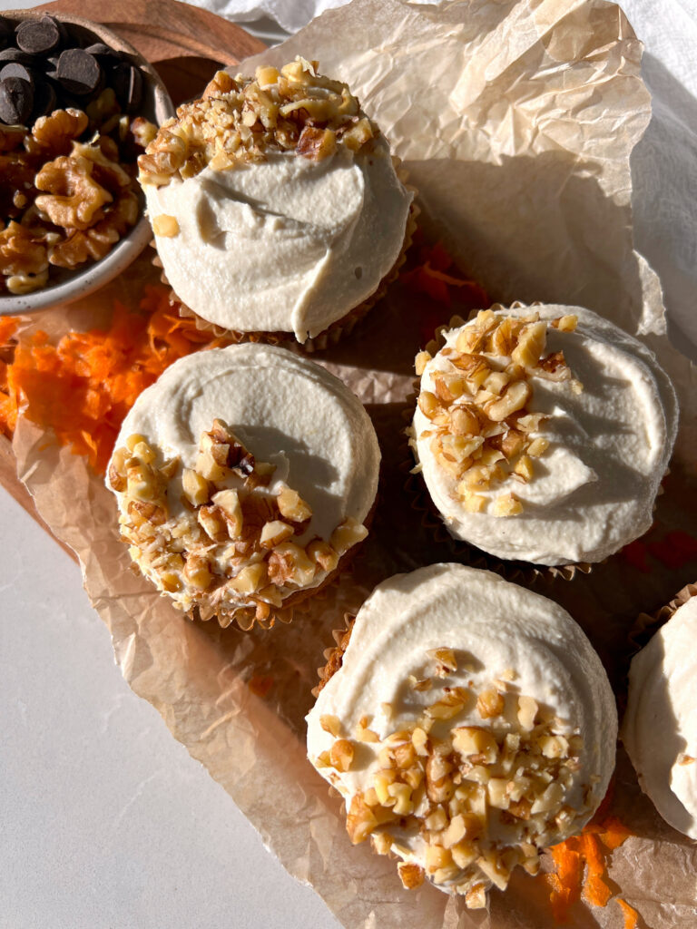 Gluten Free Carrot Cake Muffins with Chocolate Chips, cream cheese frosting and chopped walnuts